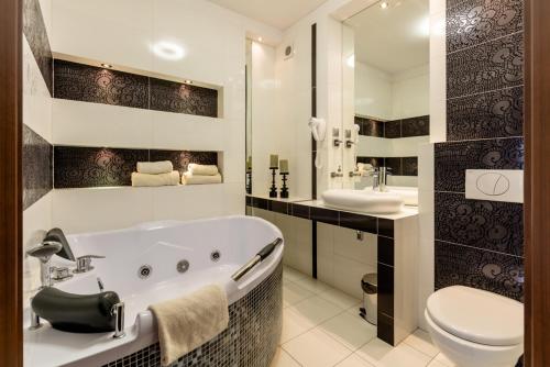 Koupelna v ubytování Hotel NORD