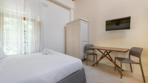 Televisyen dan/atau pusat hiburan di Italianway - Locanda della Meridiana