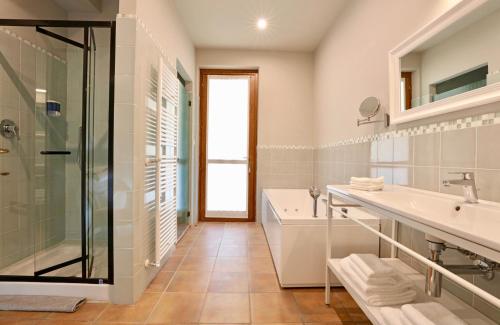 Koupelna v ubytování LE SETTE VIE HOLIDAY HOMES