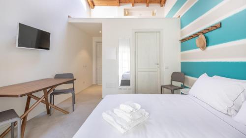 Katil atau katil-katil dalam bilik di Italianway - Locanda della Meridiana