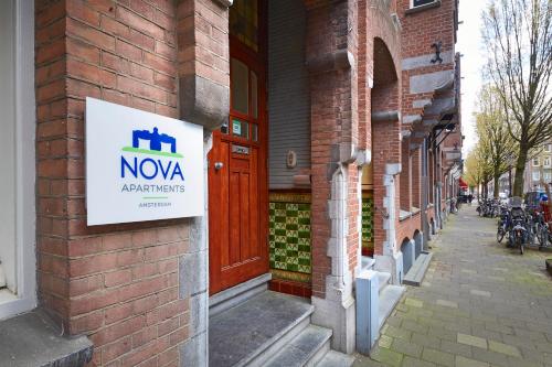 a nova appliances sign on the side of a building at Nova Apartments Amsterdam in Amsterdam