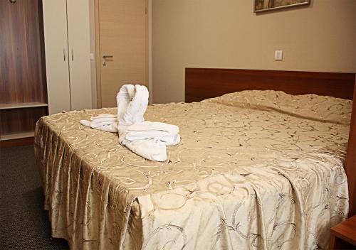 Postel nebo postele na pokoji v ubytování Hotel Ambasador