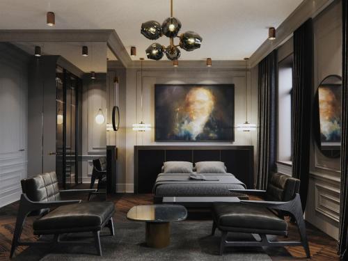 um quarto com uma cama, uma mesa e cadeiras em A22 Hotel em Riga