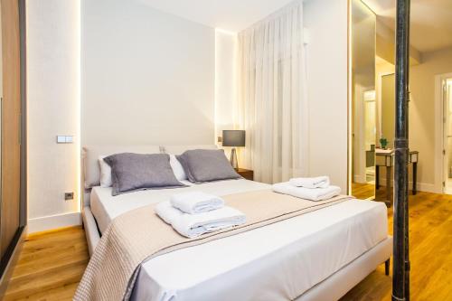 Llit o llits en una habitació de Luxury Apartment Salamanca District