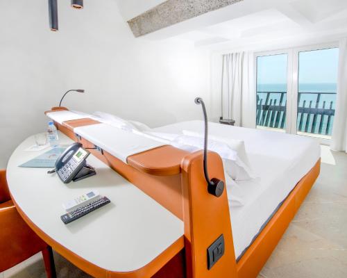 Voodi või voodid majutusasutuse Hotel Lagon 2 toas
