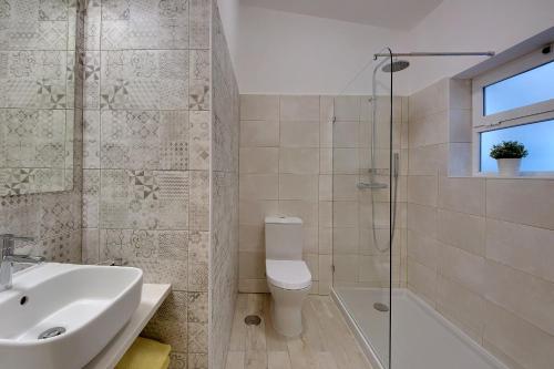 Ванна кімната в Apartamentos Tucha