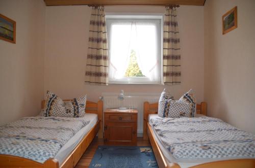 Postel nebo postele na pokoji v ubytování Ferienwohnungen Eichenhof