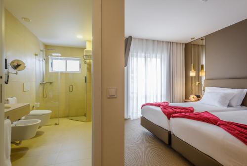 Koupelna v ubytování Hotel Regina