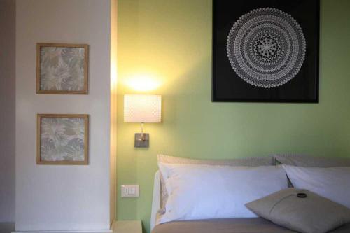 Кровать или кровати в номере I grilli b&b
