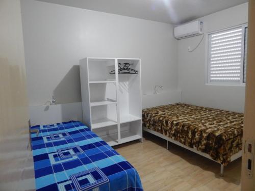 Voodi või voodid majutusasutuse Casa Amarela toas