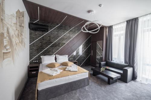 Ένα ή περισσότερα κρεβάτια σε δωμάτιο στο Boutique Guest house 7th Sense