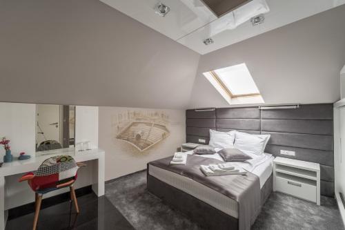 Ένα ή περισσότερα κρεβάτια σε δωμάτιο στο Boutique Guest house 7th Sense