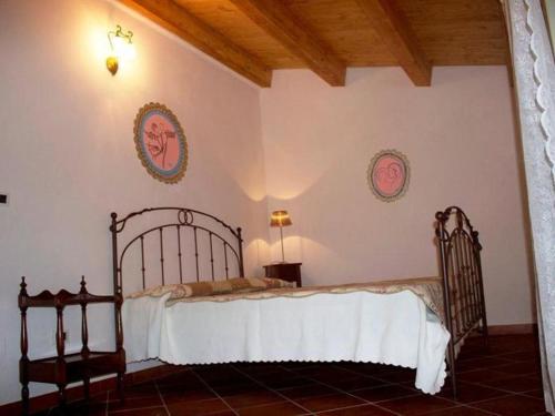 سرير أو أسرّة في غرفة في Villa Adriana