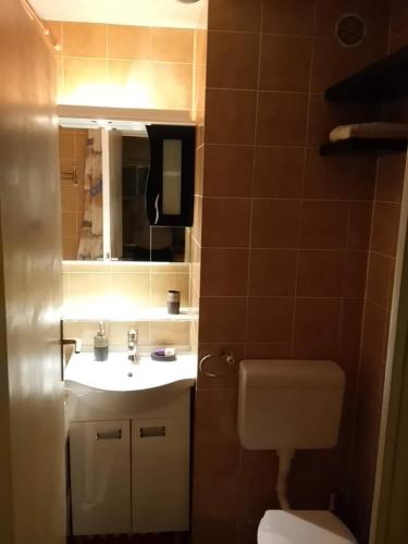 Bilik mandi di Two Rivers Apartment