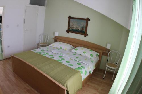 Apartmani Šurlinにあるベッド