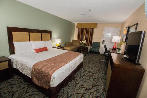 Postel nebo postele na pokoji v ubytování Key West Inn - Fairhope