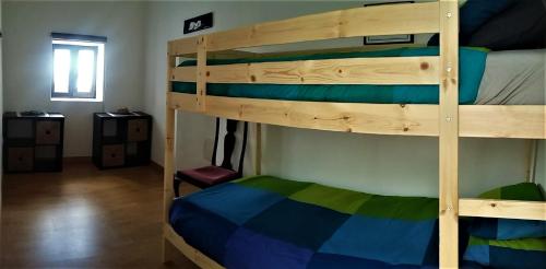 Dviaukštė lova arba lovos apgyvendinimo įstaigoje Casa Caldera Guiguan