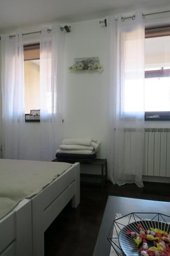 Ένα ή περισσότερα κρεβάτια σε δωμάτιο στο Apartments and Rooms Štefanac
