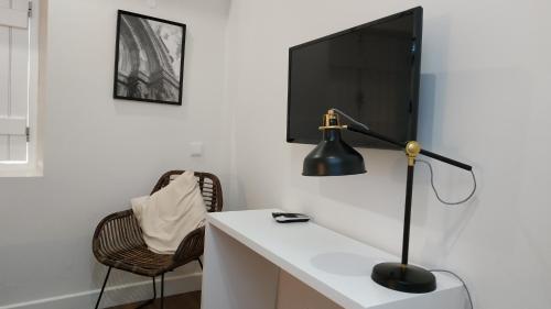 TV a/nebo společenská místnost v ubytování Bartholomeu GuestHouse 2