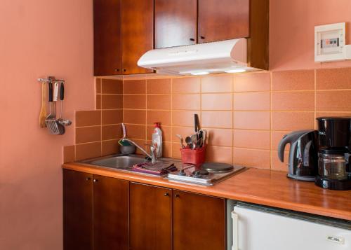 Kitchen o kitchenette sa Iason Studios