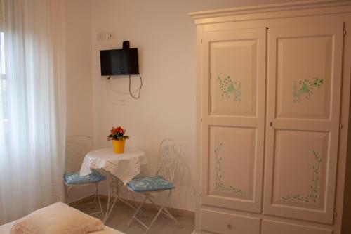 TV a/nebo společenská místnost v ubytování B&B Giu&Gio