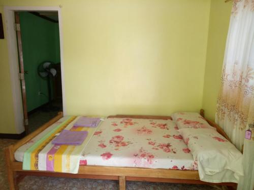 Katil atau katil-katil dalam bilik di Xylla Guesthouse