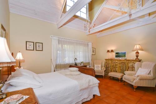 Ένα ή περισσότερα κρεβάτια σε δωμάτιο στο Ford House Bed & Breakfast