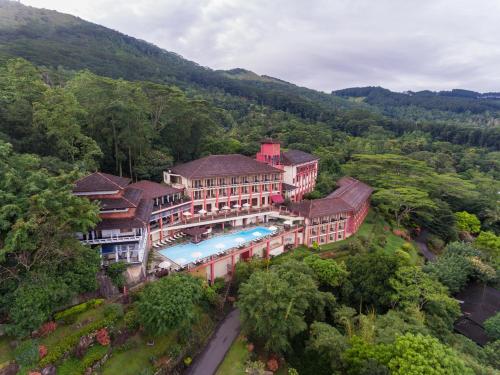 an aerial view of a building with a swimming pool at Amaya Hills Kandy in Kandy