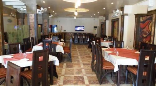 Restorāns vai citas vietas, kur ieturēt maltīti, naktsmītnē Solo Hotel & Restaurant