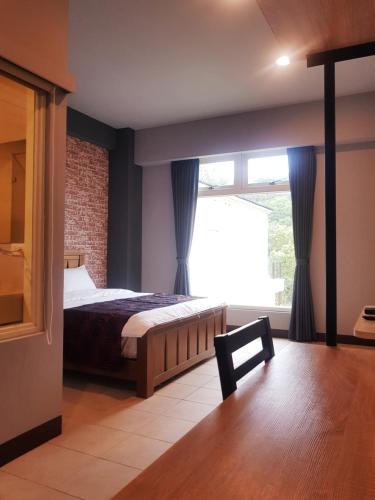 Postel nebo postele na pokoji v ubytování Moon Shine B&B