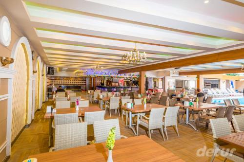 Restoranas ar kita vieta pavalgyti apgyvendinimo įstaigoje Lavinia Apart & Hotel