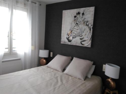 Photo de la galerie de l'établissement 24 Fois Plus - Circuit des 24 H à 10 mn - 2 Chambres, 4 personnes & Cuisine, au Mans