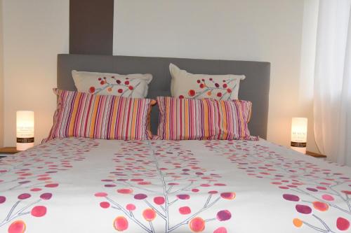 En eller flere senge i et værelse på Les chambres du Foulot