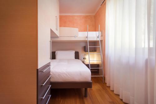Ένα ή περισσότερα κρεβάτια σε δωμάτιο στο CASA MINERVA