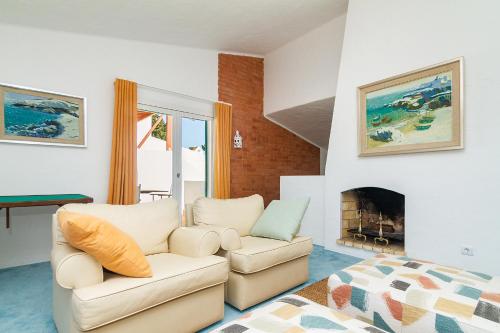 A seating area at Liiiving in Algarve - Alvor Blue Villa