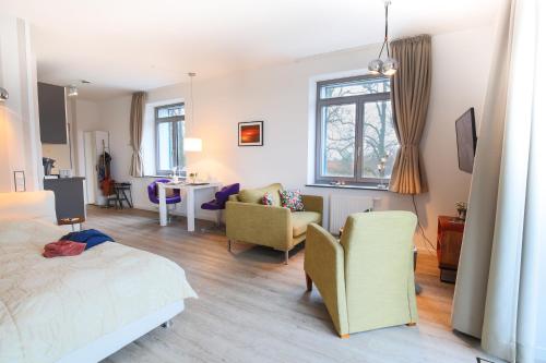 Postel nebo postele na pokoji v ubytování Appartements Villa Schwanenteich