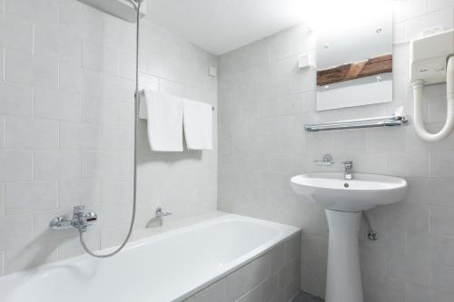 Koupelna v ubytování Hotel Celerin