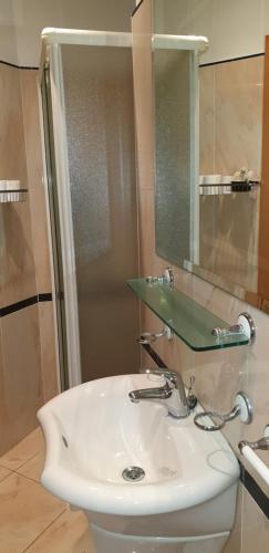 Koupelna v ubytování Hotel Ginevra