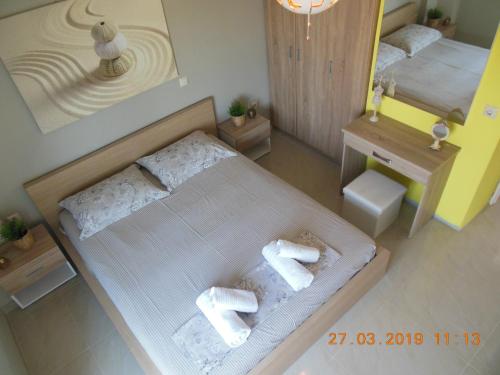 Postel nebo postele na pokoji v ubytování BIO Garden New House