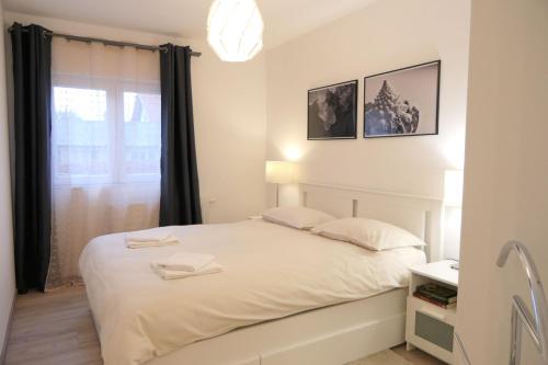 Ένα ή περισσότερα κρεβάτια σε δωμάτιο στο Bruna
