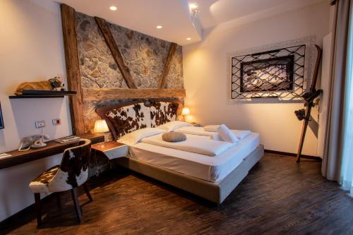 Postel nebo postele na pokoji v ubytování Hotel Corona