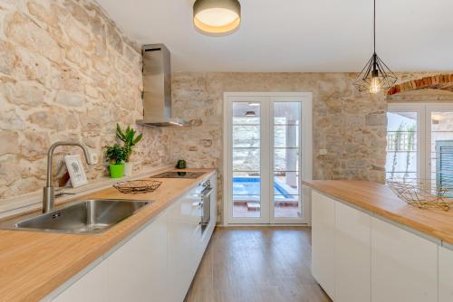 Kuchyň nebo kuchyňský kout v ubytování Holiday home Rocca