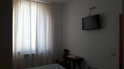 Foto da galeria de Il Grifo Camere e Suites em Grosseto