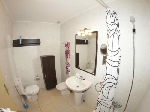 Koupelna v ubytování DUPLEX C6 con PISCINA PRIVADA