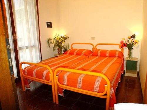 Ένα ή περισσότερα κρεβάτια σε δωμάτιο στο Villa con 3 camere da letto