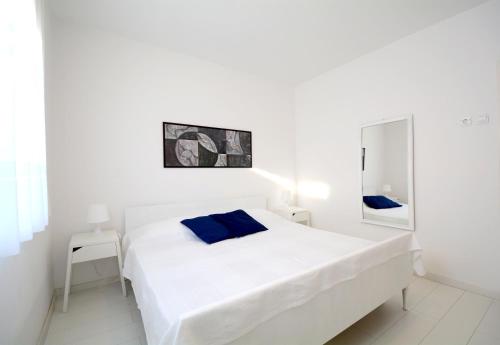 Postel nebo postele na pokoji v ubytování Apartments Morgan