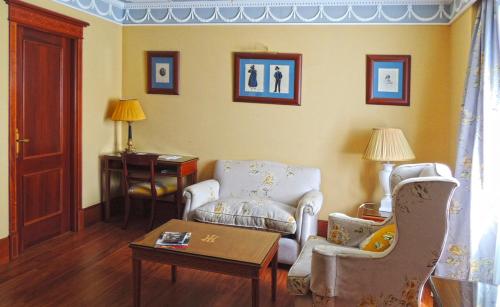 Гостиная зона в Hotel Inglaterra