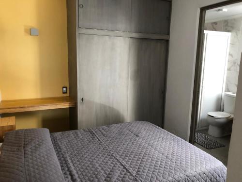 Postel nebo postele na pokoji v ubytování Casa Maye