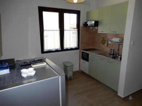 Kuhinja ili čajna kuhinja u objektu Apartments Simicev