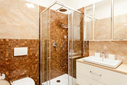 a bathroom with a shower and a sink at New luxury apartment Nives on seaside in Split